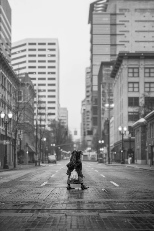 a person riding a skateboard down a city street, a black and white photo, unsplash contest winner, cascadia, empty streetscapes, square, :: morning