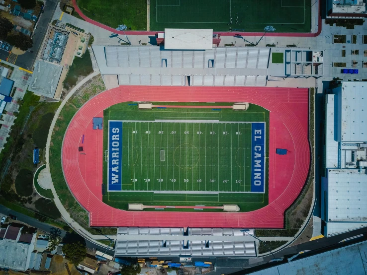 an aerial view of a stadium with a football field, a digital rendering, unsplash contest winner, quito school, j. h. williams iii, portrait shot, 15081959 21121991 01012000 4k, turf roof