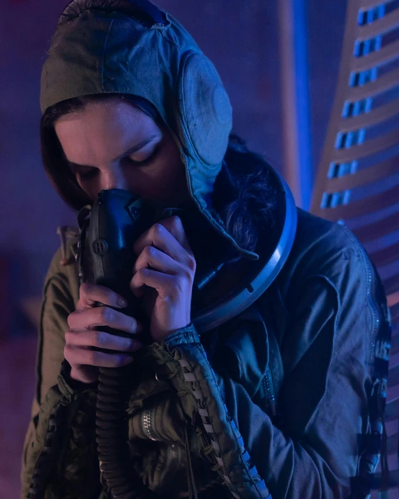 a woman holding a camera up to her face, cyberpunk art, inspired by Elsa Bleda, air force jumpsuit, reylo kissing, wearing tactical gear, instagram picture