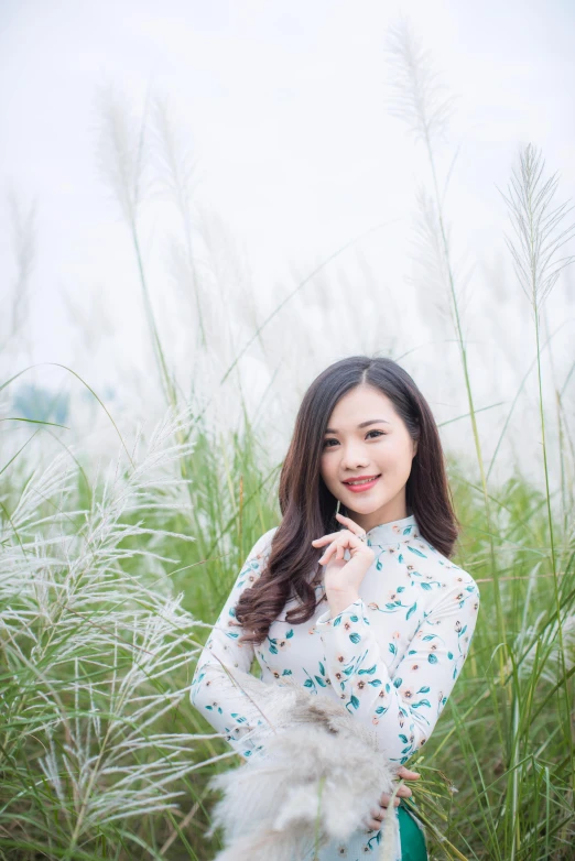 a woman standing in a field of tall grass, by Tan Ting-pho, portrait image, ruan cute vtuber, white, 2 0 yo