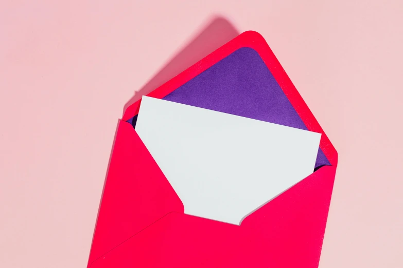 a pink envelope with a piece of paper sticking out of it, by Julia Pishtar, trending on pexels, letterism, purple and red, material design, thick lining, holiday