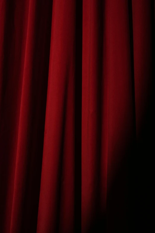 a red curtain with a black background, wearing red clothes, up close, large)}], up-close