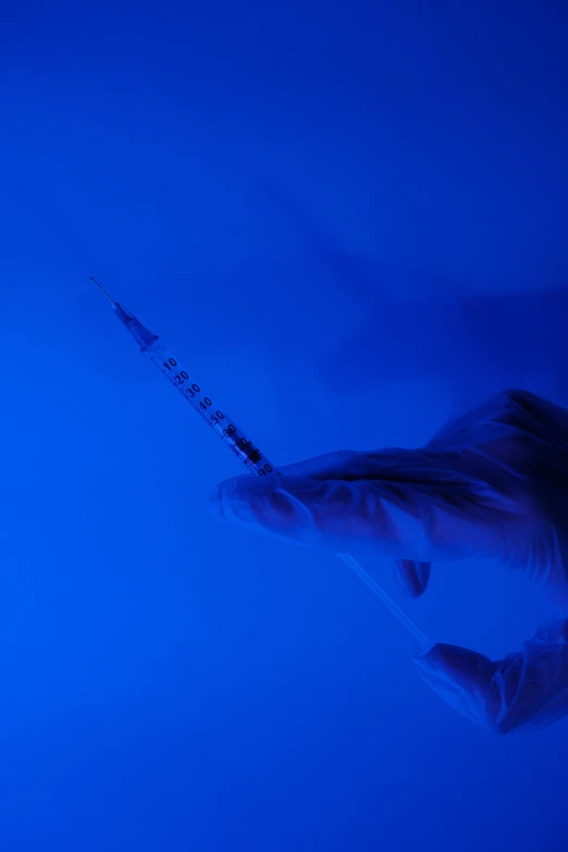 a man flying through the air while holding a tennis racquet, by Greg Rutkowski, flickr, process art, surgical iv drip, blue shark, with blue light inside, medium close-up shot