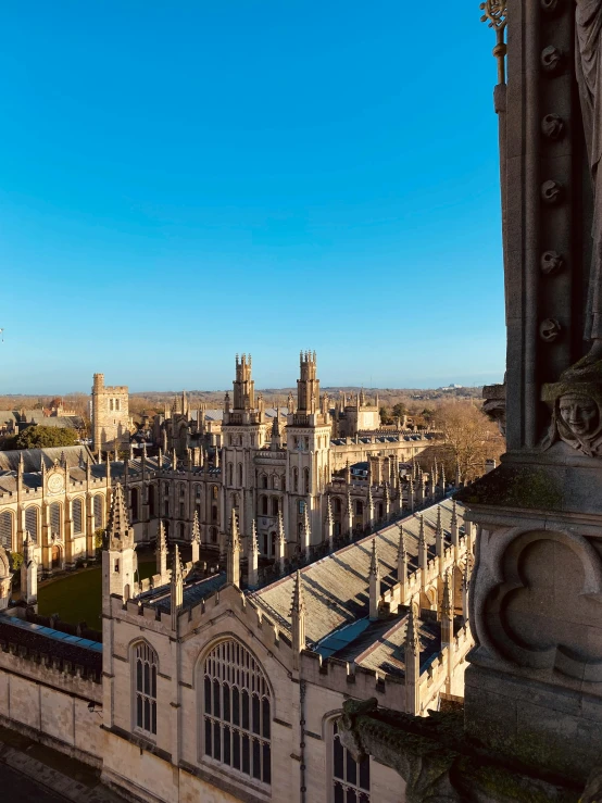 a view of a city from the top of a building, academic art, cathedrals and abbeys, an award winning, tudor architecture, square