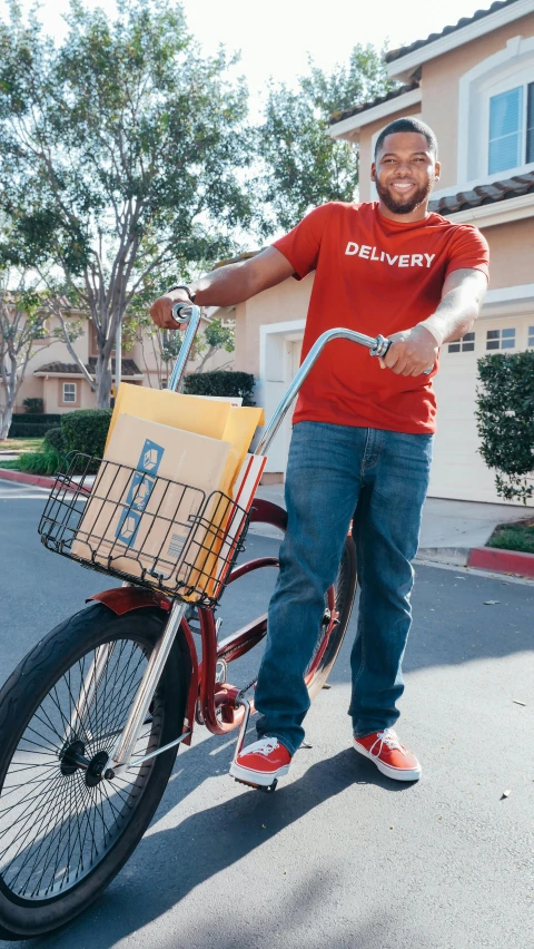 a man standing next to a bike with a basket on it, profile image