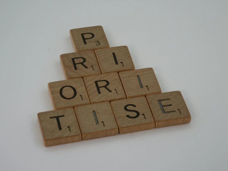 a pile of scrabbles sitting on top of a table, inspired by Primrose Pitman, pexels contest winner, private press, engraved, - 12p, virtuoso, spire