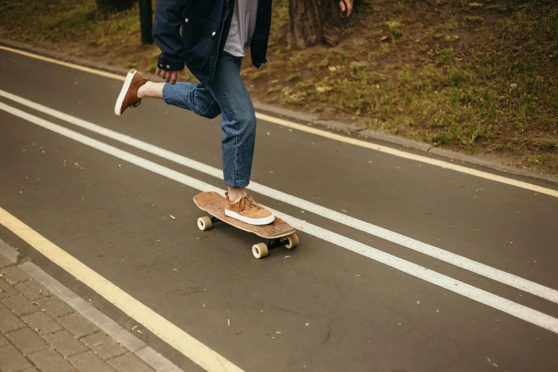 a man riding a skateboard down a street, pexels contest winner, 15081959 21121991 01012000 4k, on a wooden plate, 7 0 s photo, denim