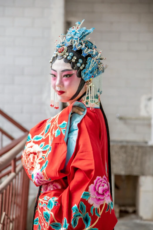 a woman in a red kimono is posing for a picture, inspired by Xie Huan, square, multicoloured, headpiece, press photos