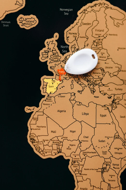 a close up of a map of africa, by Julia Pishtar, graffiti, an egg, magnetic, large shell, scandinavia