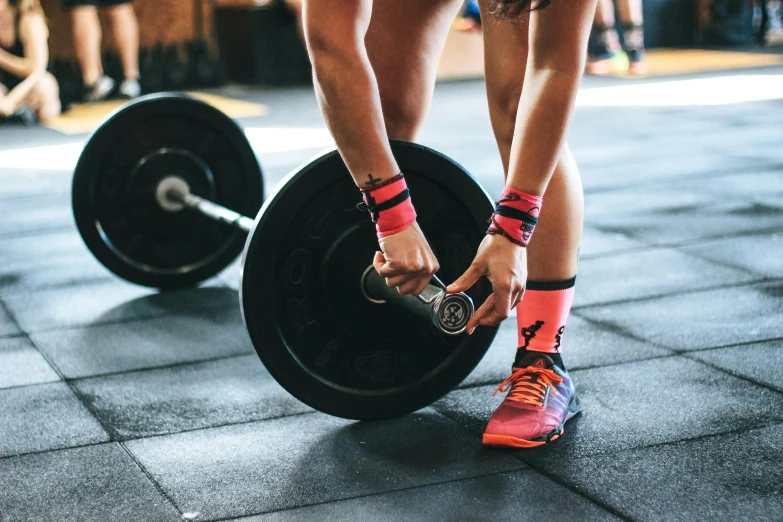 a close up of a person holding a barbell, profile image, running shoes, 🦩🪐🐞👩🏻🦳, sports photo