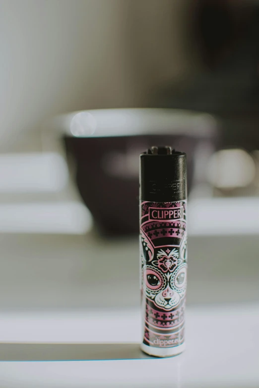 a bottle of perfume sitting on top of a counter, a stipple, inspired by An Gyeon, graffiti, smoke columns, close-up shot taken from behind, buzzed hair on temple, highly upvoted