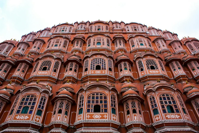 a very tall building with lots of windows, pexels contest winner, renaissance, of indian princess, the red citadel, 🦩🪐🐞👩🏻🦳, square