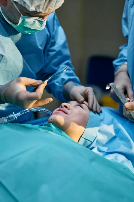 a group of surgeons performing surgery on a patient, a picture, by Dan Content, shutterstock, high forehead, thumbnail, 2717433015, high quality picture