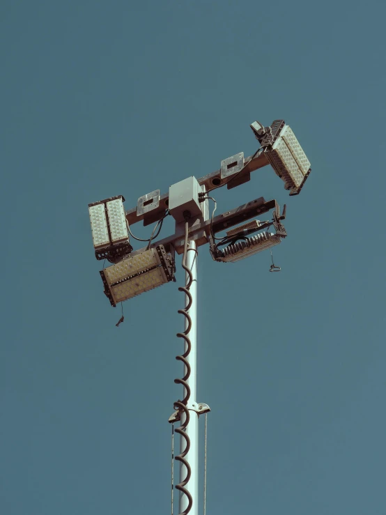 a street light sitting on top of a metal pole, by Adam Marczyński, postminimalism, beeple. hyperrealism, sports, surveillance camera, concert