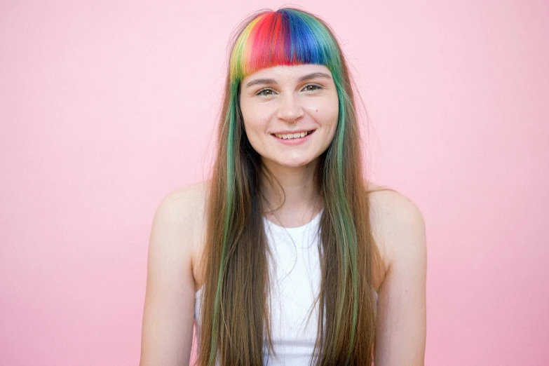 a close up of a person with long hair, trending on pexels, rainbow accents, portrait of normal teenage girl, whitebangs, technicolour 1