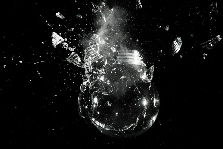 a black and white photo of a light bulb exploding, an album cover, by Adam Pijnacker, process art, full of glass. cgsociety, space debris, hyperdetailed scp artifact jar, ffffound