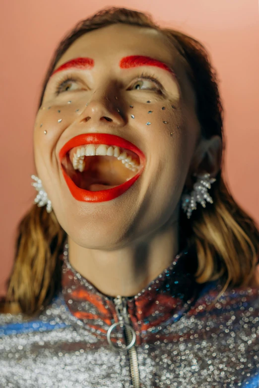 a close up of a person with makeup on, by Julia Pishtar, antipodeans, she is laughing, lucy in the sky with diamonds, bright red lipstick, buck teeth