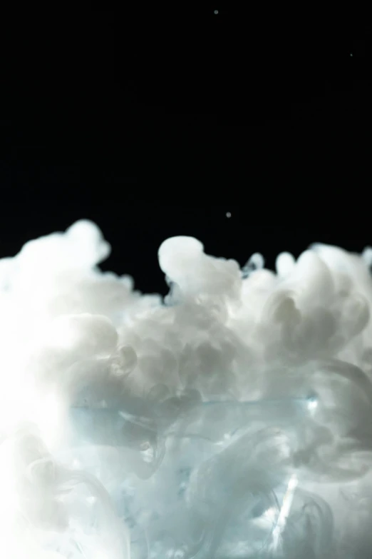 a glass filled with liquid sitting on top of a table, a macro photograph, by Daniel Seghers, unsplash, conceptual art, white fluffy cloud, background ( smoke, abstract claymation, avatar image