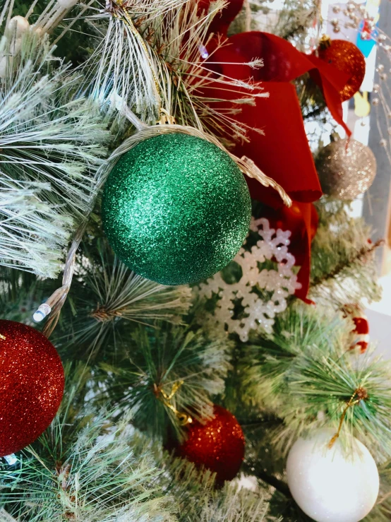 a close up of a christmas tree with ornaments, viridian and venetian red, carson ellis, multiple, mix