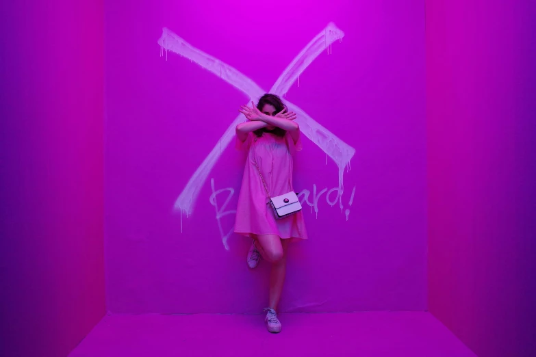 a woman in a pink dress standing in a pink room, pexels contest winner, graffiti, x logo, ulzzang, neon cross, exhibition