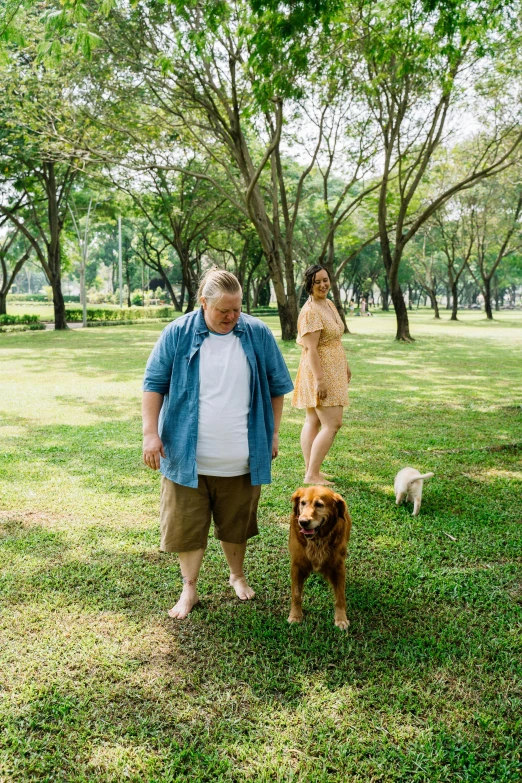 a man and a woman walking a dog in a park, an album cover, unsplash, obese, lawn, asian man, full body photo of steve