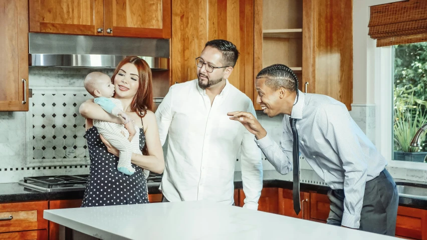 a group of people in a kitchen with a baby, josan gonzalez and tyler edlin, caring fatherly wide forehead, hr ginger, profile image