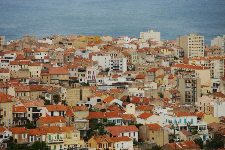 a view of a city from the top of a hill, by Daniël Mijtens, pexels contest winner, renaissance, mediterranean fisher village, 2 5 6 x 2 5 6 pixels, stacked houses, biennale