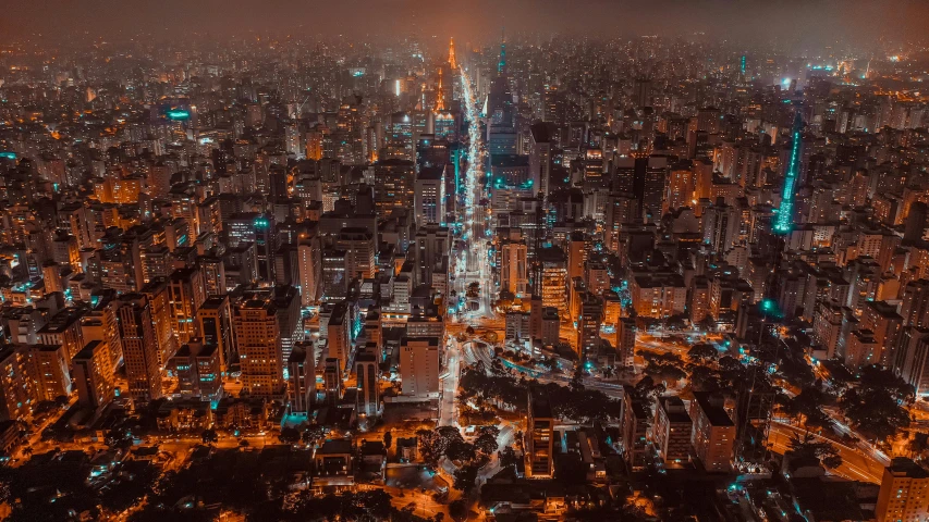 an aerial view of a city at night, an album cover, pexels contest winner, sao paulo in the year 2 0 7 0, orange and cyan lighting, tourist photo, profile picture 1024px