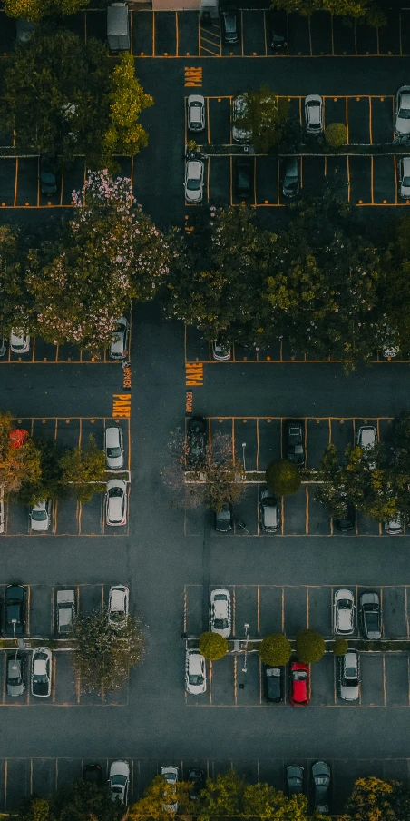 a parking lot filled with lots of parked cars, pexels contest winner, many trees and plants, satellite imagery, square, thumbnail