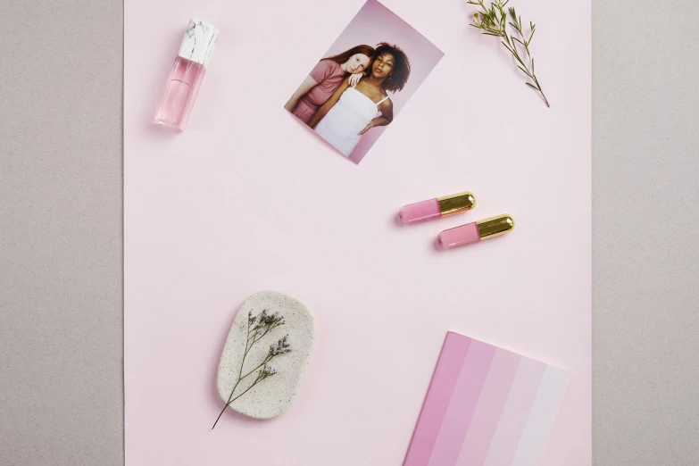 a picture of a woman on a pink background, a picture, trending on pexels, color field, floating in perfume, on a desk, on grey background, pins of light