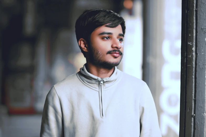 a close up of a person wearing a hoodie, pexels contest winner, hurufiyya, vinayak, discord profile picture, architect, profile image