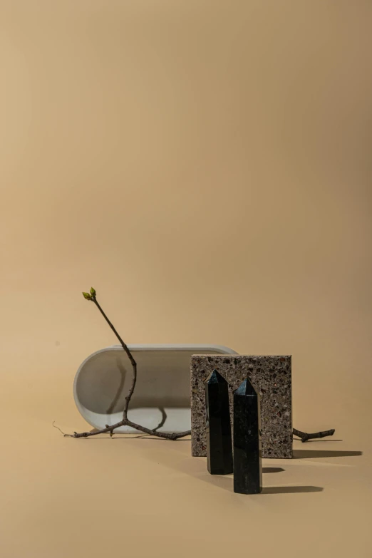 a couple of vases sitting on top of a table, an abstract sculpture, inspired by Giorgio Morandi, conceptual art, cracks, nature meets architecture, rectangle, product design shot
