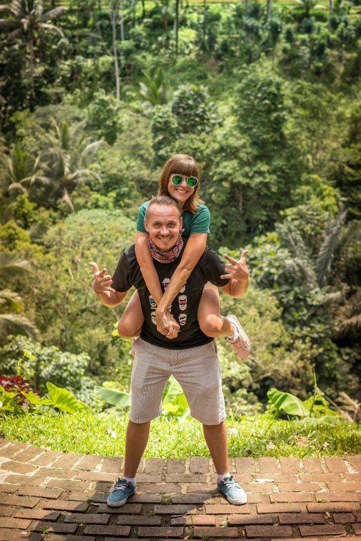 a man carrying a little girl on his shoulders, a picture, sumatraism, lush surroundings, avatar image, lachlan bailey, silly