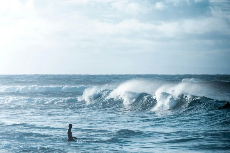 a person in a body of water with a surfboard, pexels contest winner, azure waves of water, 5 feet away, ( ( ( ( kauai ) ) ) ), tsunami