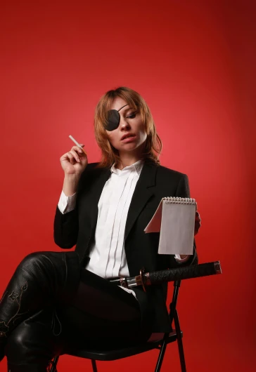 a woman sitting in a chair smoking a cigarette, an album cover, inspired by Leila Faithfull, trending on pixabay, neo-dada, in a business suit, biker, sam hyde, professional cosplay