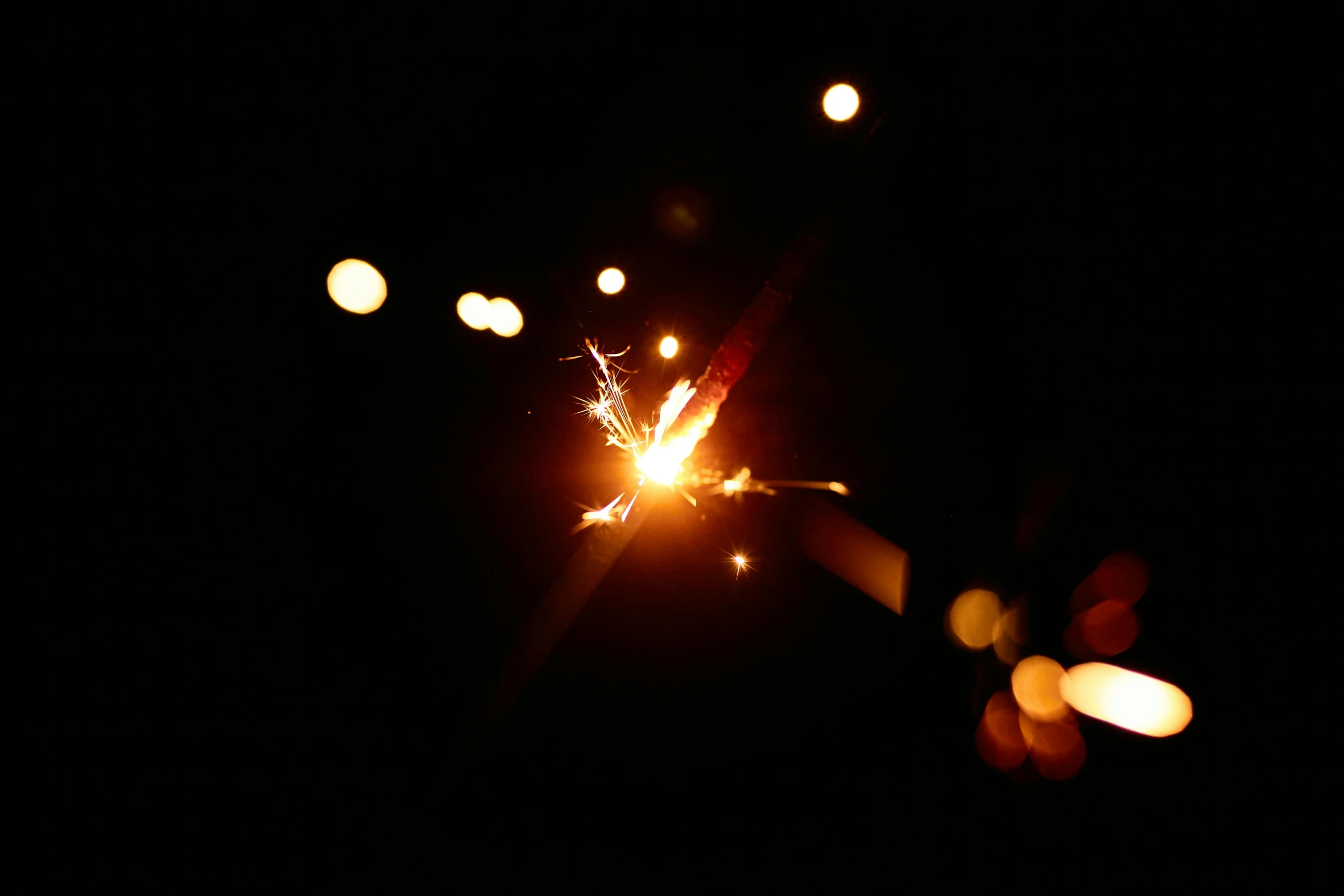 a person holding a sparkler in the dark, a picture, ignant, laser light *, medium shot angle, welding torches for arms