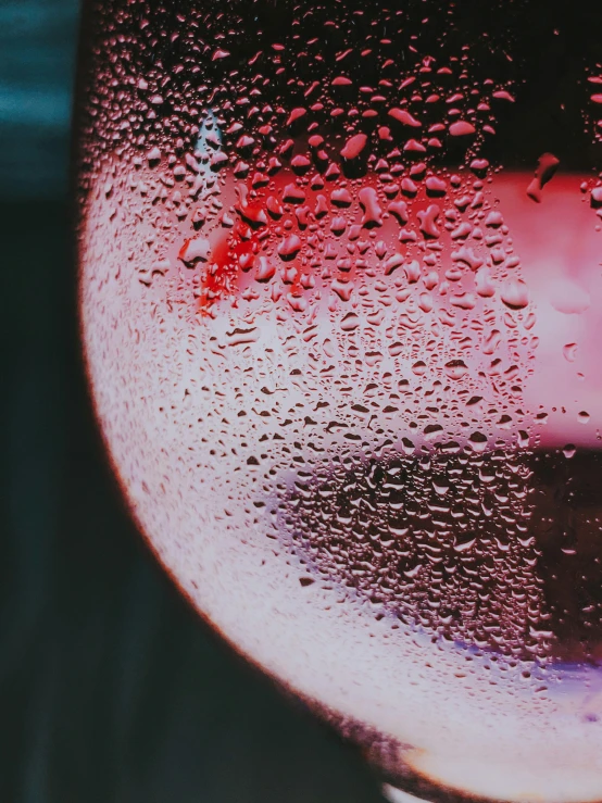 a close up of a wine glass with water droplets, inspired by Elsa Bleda, pexels contest winner, process art, glowing pink face, vhs colour photography, today\'s featured photograph 4k, covered in