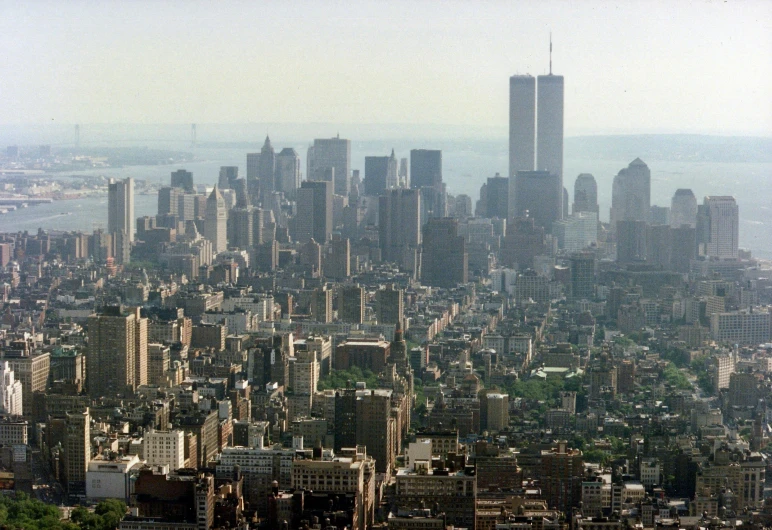 a view of a city from the top of a building, by Robert M. Cunningham, world trade center twin towers, remaster, fan favorite, 2 0 2 2 photo