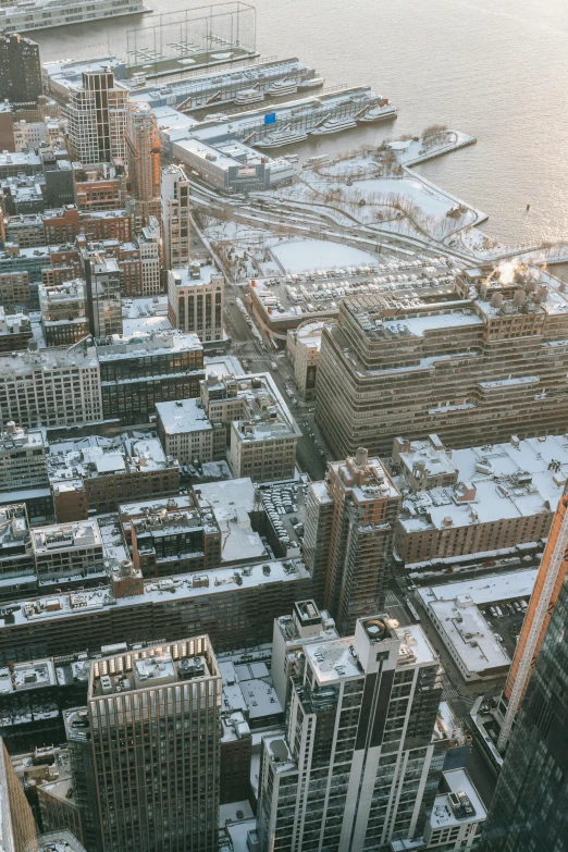 a view of a city from the top of a building, new - york skyline in winter, 2019 trending photo, high angle uhd 8 k, full frame image