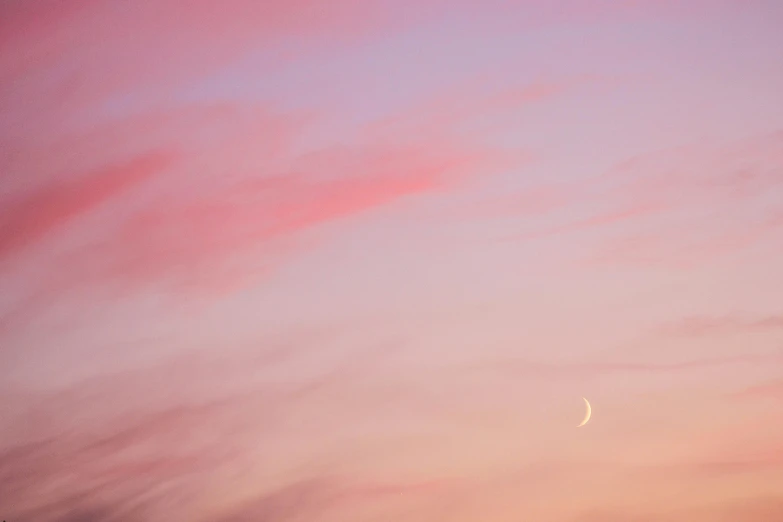 a pink sky with a crescent in the middle, by Liza Donnelly, unsplash, aestheticism, archival pigment print, soft light - n 9, moons, colours of the sunset