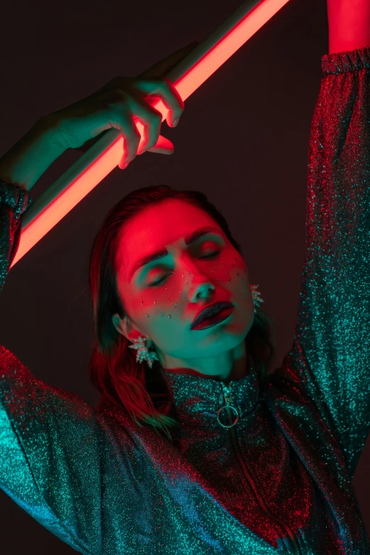 a woman holding a baseball bat over her head, inspired by Elsa Bleda, holography, mahira khan as a mage, flashy red lights, fashion editorial, press shot