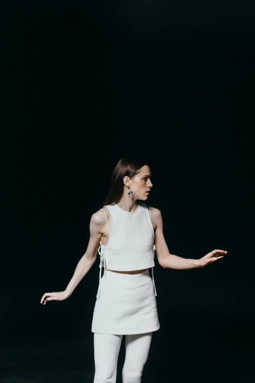 a woman in a white top and white pants, by Sara Saftleven, pexels contest winner, wearing a formal dress, anorexic figure, wearing a tanktop and skirt, grimes