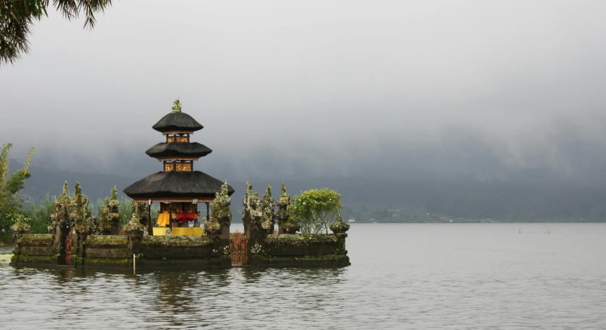 a small building in the middle of a body of water, pexels contest winner, sumatraism, fan favorite, grey, shrines, unedited