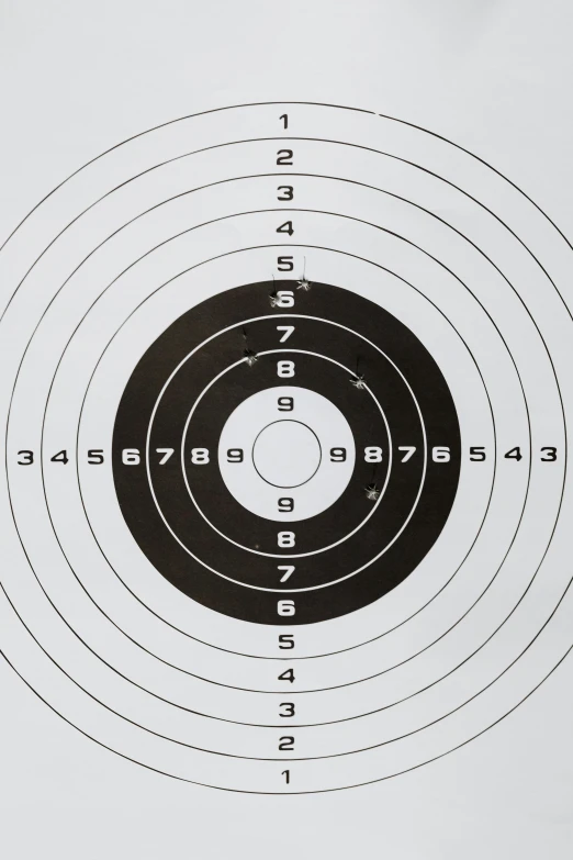 a black and white target with numbers on it, black on white paper, getty images, long range, round-cropped