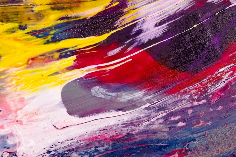 a close up of a colorful painting on a piece of paper, trending on pexels, some red and purple and yellow, swoosh, lacquer on canvas, galaxy