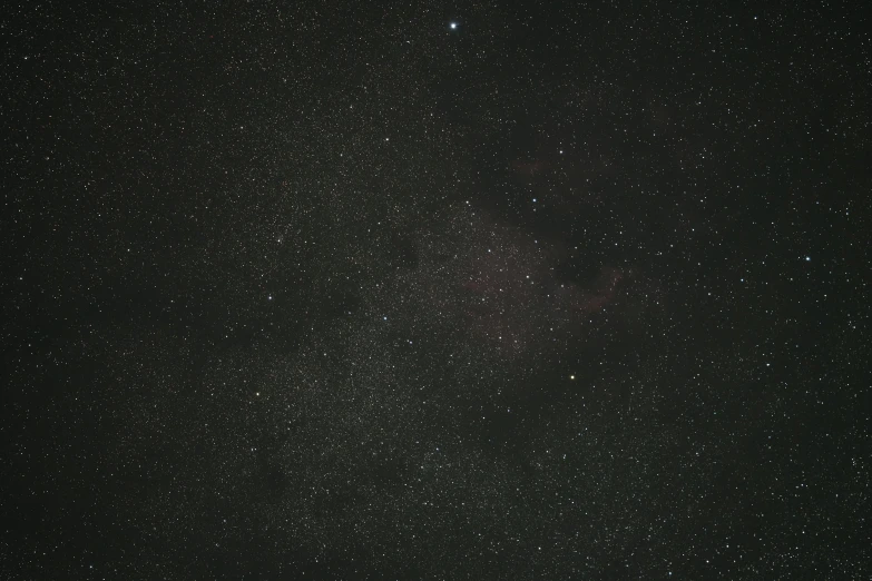 a dark sky filled with lots of stars, a microscopic photo, pexels, detailed medium format photo, background ( dark _ smokiness ), cloud nebula, taken with sony alpha 9