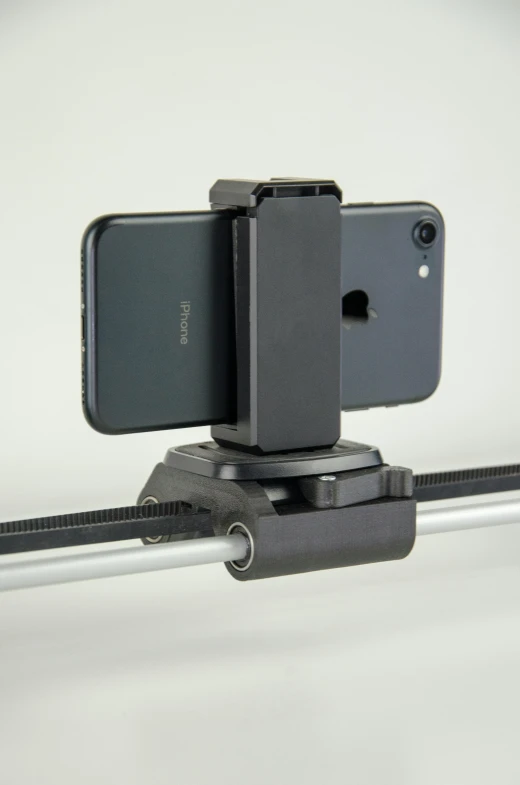 a close up of a cell phone on a tripod, a portrait, pod racer, detailed product shot, portrait n - 9, wide