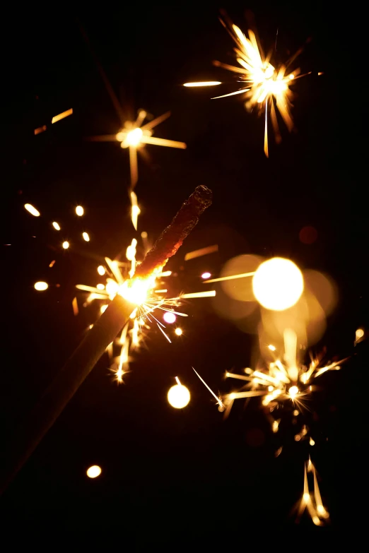 a couple of sparklers that are in the dark, glittering stars scattered about, with sparking circuits, promo image, sparkling in the sunlight