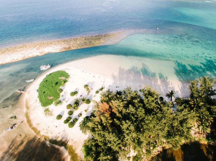 a small island in the middle of the ocean, pexels contest winner, hurufiyya, white beaches, flat lay, parks and lakes, conde nast traveler photo