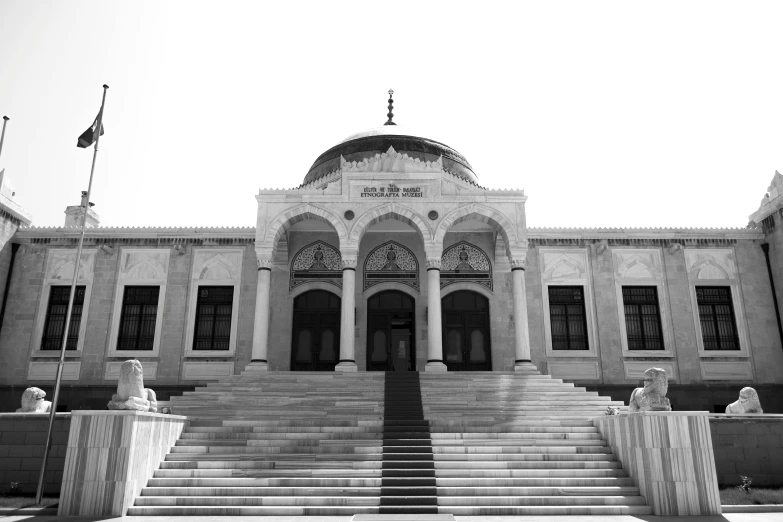 a black and white photo of a large building, by Ismail Acar, mausoleum, steps leading down, islamic, private academy entrance